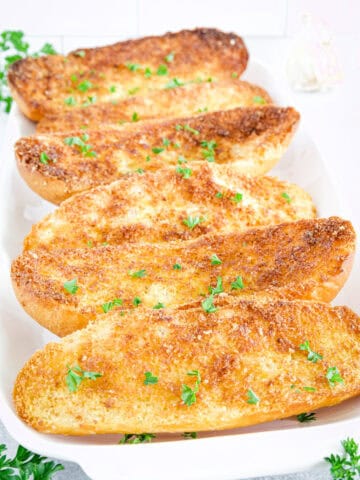 This garlic bread in air fryer recipe is a family favorite for good reason. It's a super easy side dish that goes with just about everything, from a hearty pasta dish to a comforting bowl of soup.