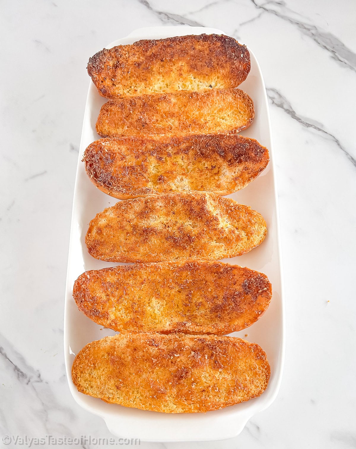 Rub a fresh garlic clove all over the bread. This will give the bread a subtle but delicious garlic flavor. 