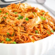 Barbeque Pulled Chicken recipe made in the Instant Pot is incredibly tender, juicy, packed with flavor, and super easy to make!