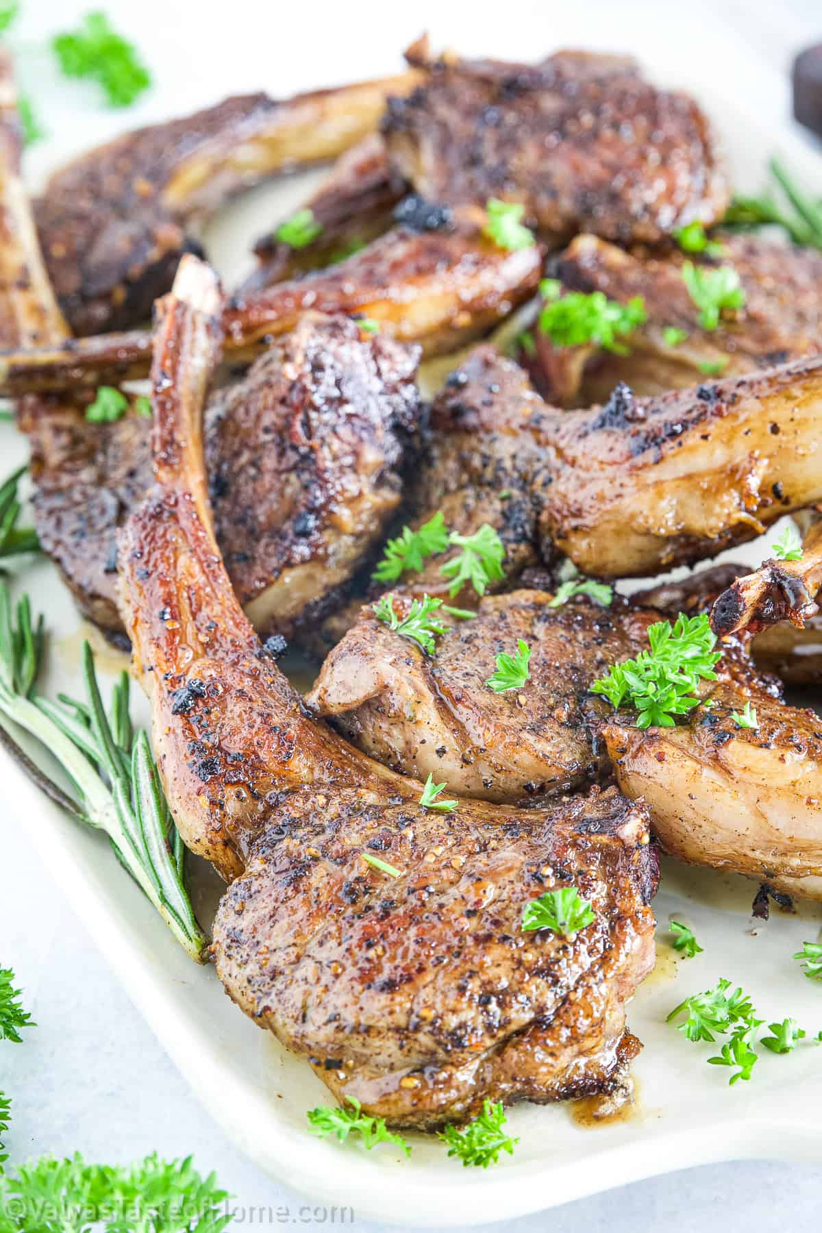 The combination of garlic, butter, and rosemary creates a savory, fragrant sauce that enhances the chops' natural juiciness.