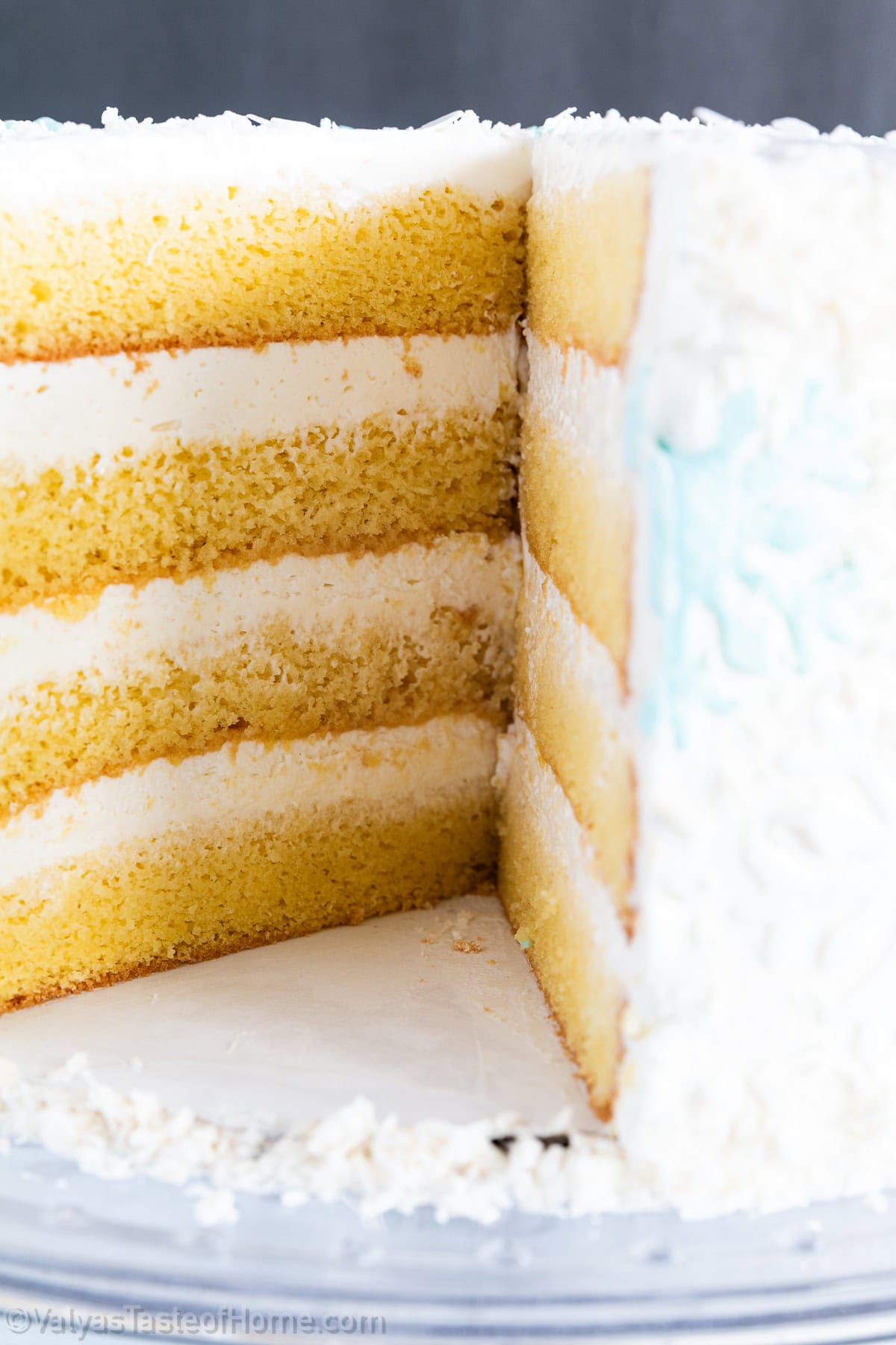 This cake is a delicious dessert that involves baking a fluffy cake, soaking it in sweet syrup, and then layering it with a creamy frosting.