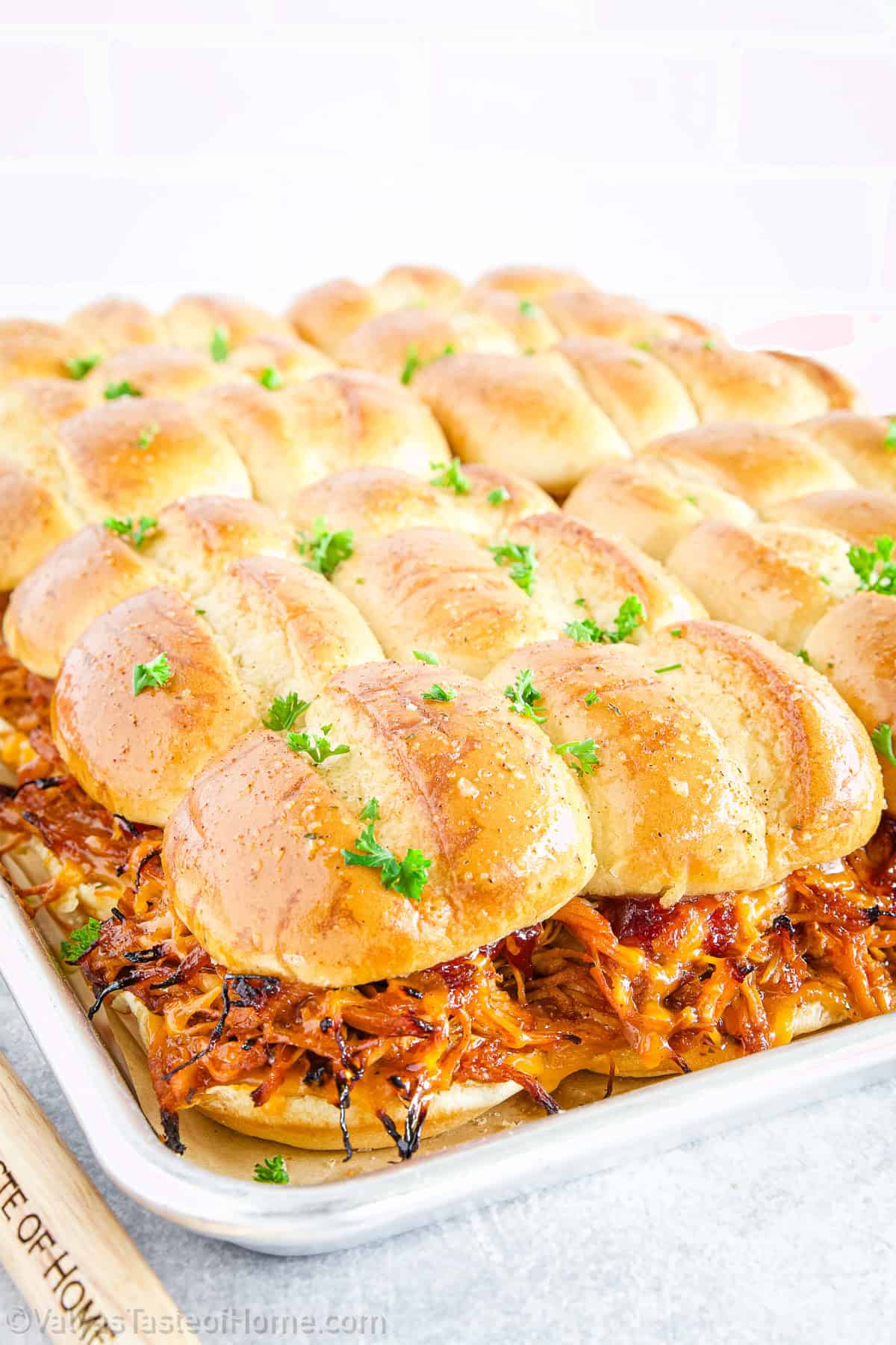 It starts with tender, slow-cooked pulled chicken that’s drenched in your favorite BBQ sauce - sweet, tangy, smoky, or spicy. 
