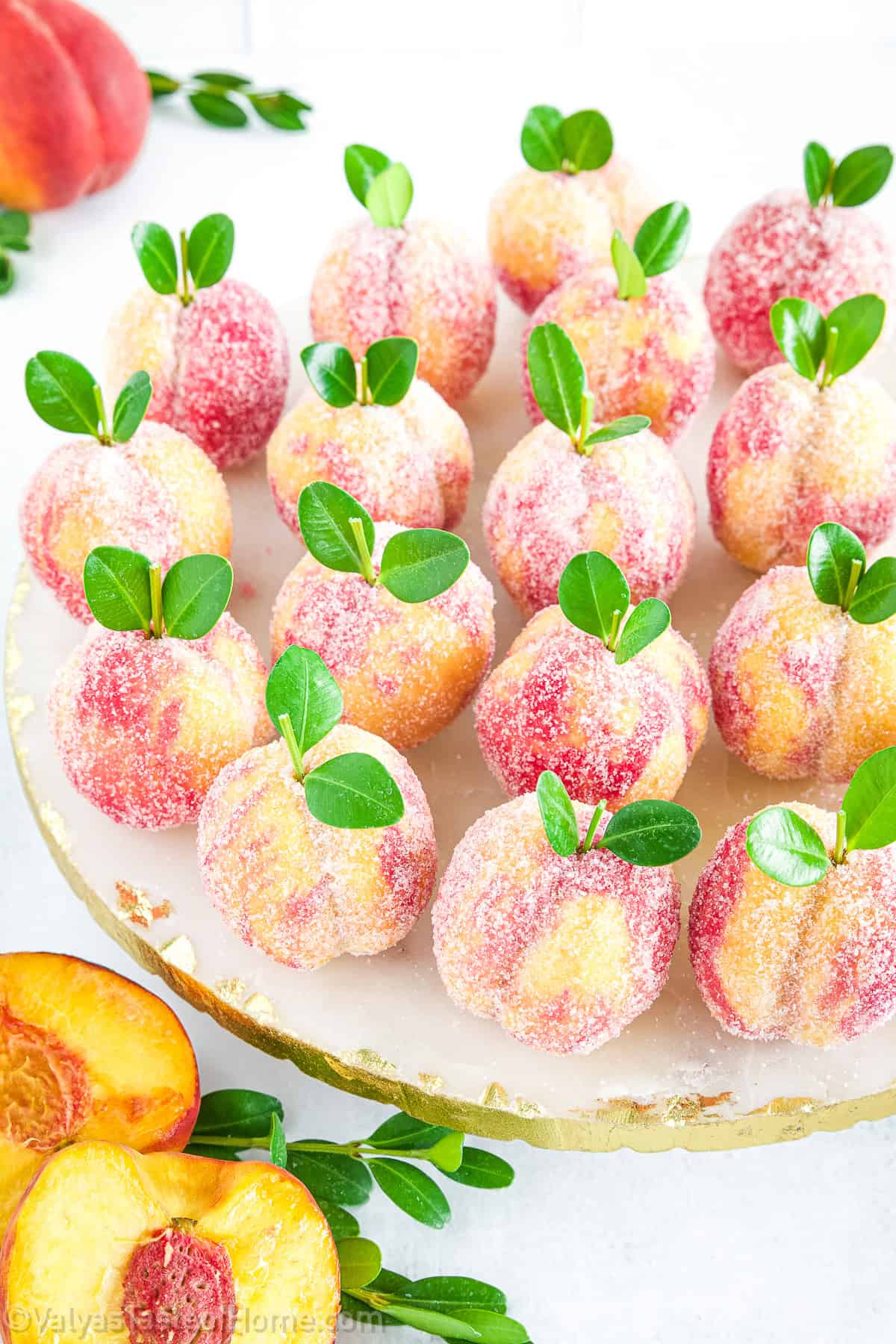 Finally, the peach cookies are rolled in fine granulated sugar, giving them the glistening, dew-kissed look of just-picked fruit.