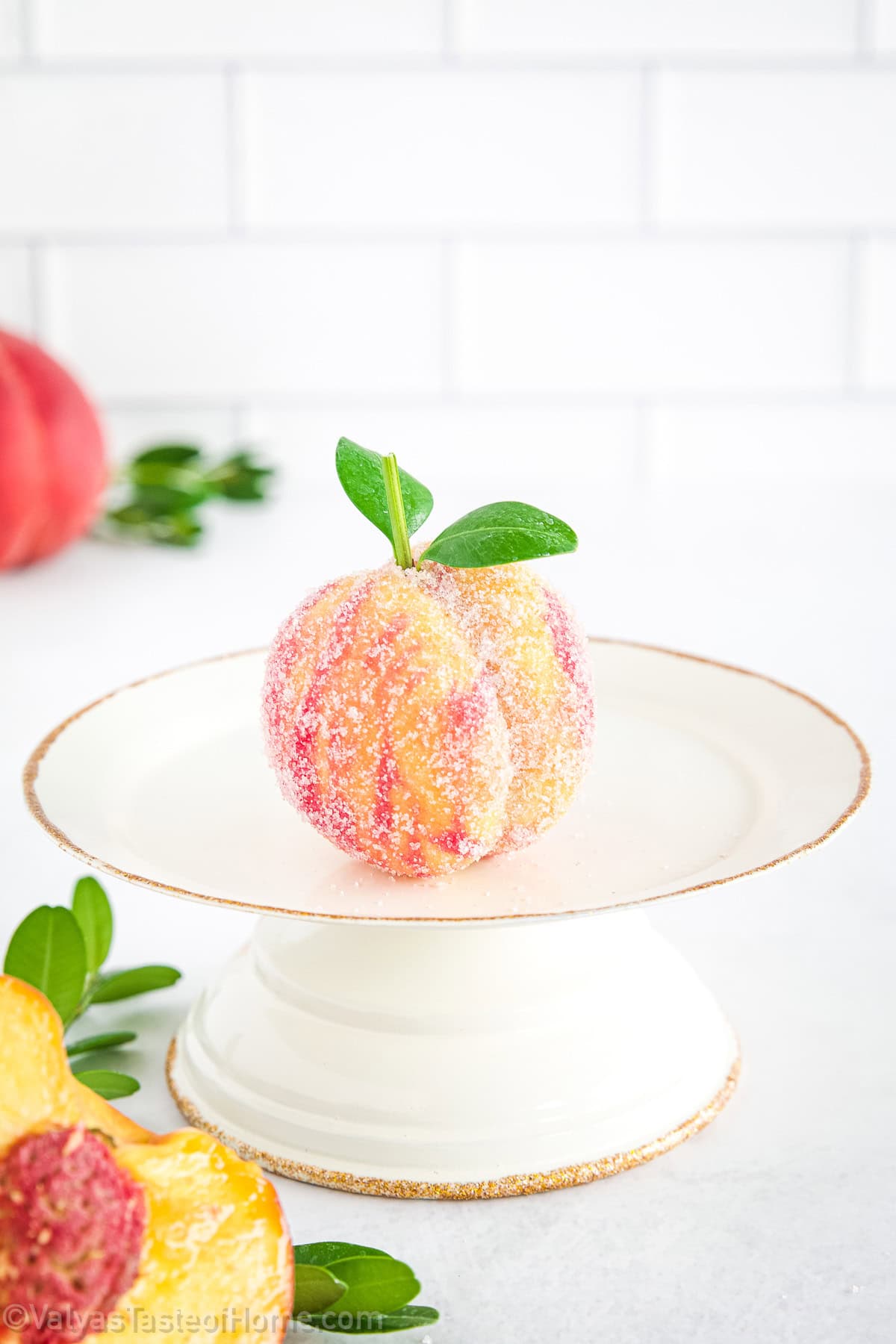 To bring the "peach" illusion to life, the assembled peach cookies are carefully dipped in a combination of fresh carrot and beet juices, all-natural dyes that lend a beautiful gradient of peachy-pink hues. 