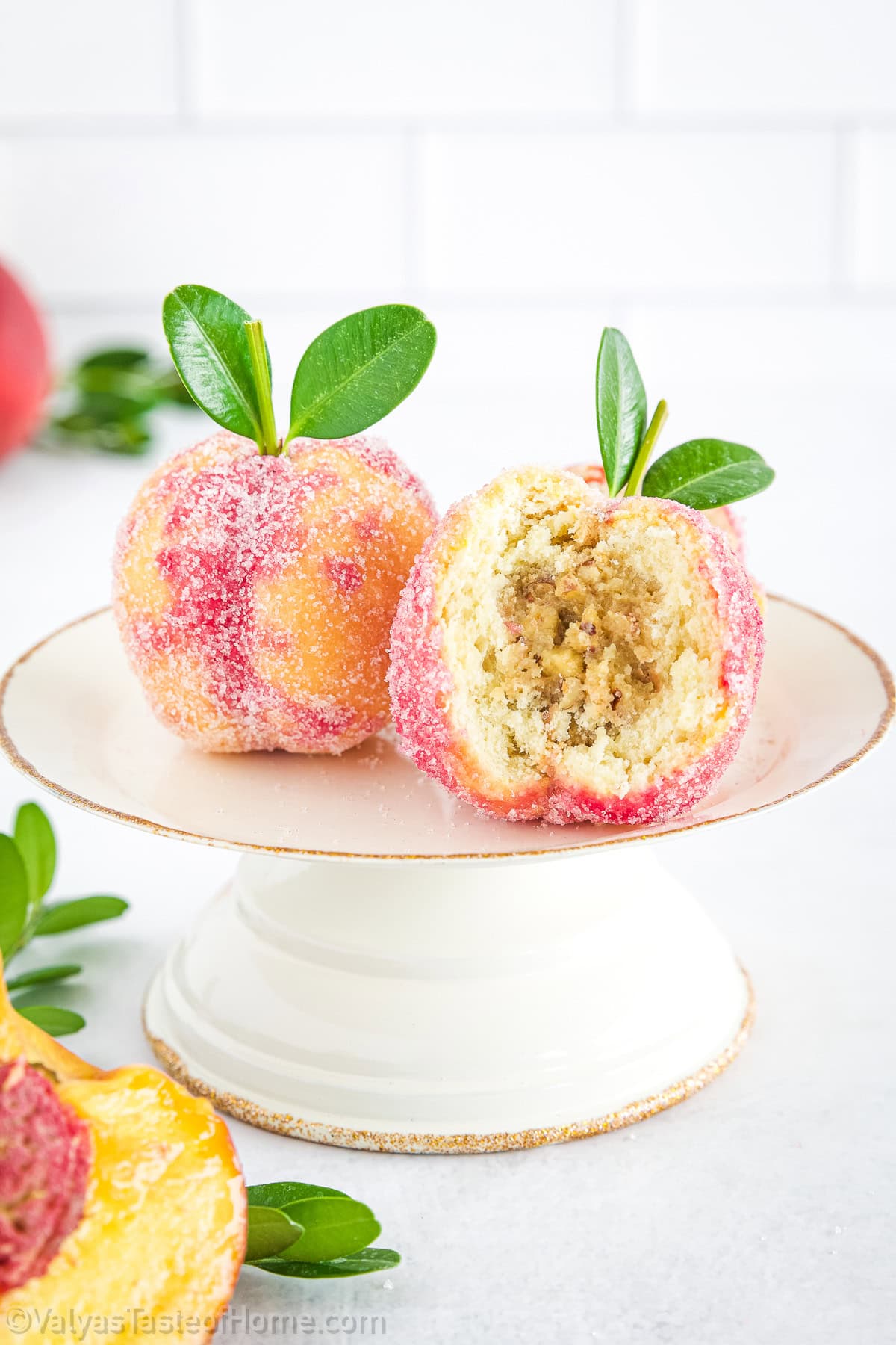 Each peach cookie begins with two light, airy sponge cake domes, baked to a soft, tender crumb that practically melts in your mouth. 