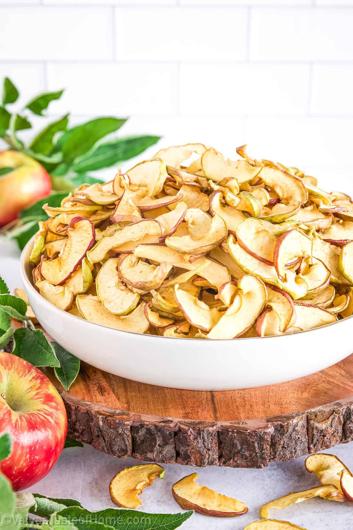 This easy Apple Chips Recipe makes delicious homemade apple chips with a naturally sweet flavor and perfectly crisp texture. They’re a healthy, simple snack for the whole family and can also be used to make a comforting European-style apple Kompot.